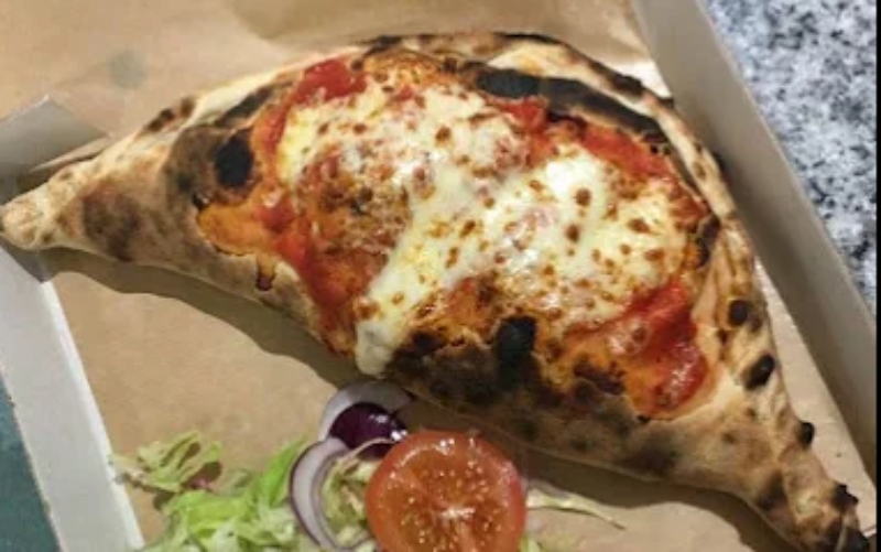 a loaded calzone served at Maurizio’s Takeaway Inverkeithing 